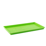Green plastic tray on a white background