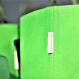 Close-up of a green bag Grow Bags - 7 Gallon Colored Fabric Pots
