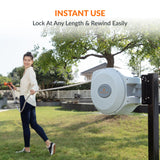 Person using a Retractable Garden Hose Reel-5/8 in-65ft in an outdoor setting with text 'Instant Use, Lock at Any Length & Rewind Easily'.