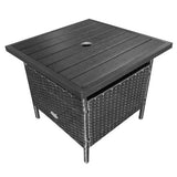 Square outdoor table with wicker sides and dark brown top on a white background