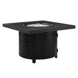 Black fire pit table with woven design on a white background