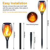 Solar torch light with flame effect, installation instructions, and dimensions on a white background.
