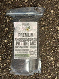 Bag of premium rhododendron potting mix on a soil background