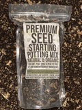 Bag of premium seed starting potting mix on a dark soil background