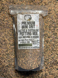 Bag of premium mini grit cactus and succulent potting mix on a textured surface