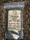 Package of premium rose potting mix on a dark, textured surface