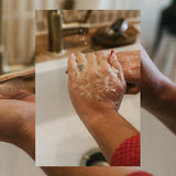 Person washing hands with soap in a kitchen sink Agave Products