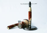 Shaving brush with wooden handle and stand on a white background