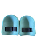 Pair of blue knee pads with black straps on a white background