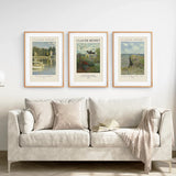 Light gray sofa with beige pillows and a blanket, featuring three framed Monet Set of 3 Printable Exhibition Posters of Claude Monet on a white wall.