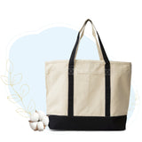 Beige tote bag with black handles and bottom on a light blue background