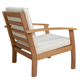 Wooden armchair with white cushions on a white background