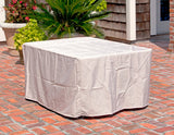 White rectangular table cover on a Longmont 48" Rectangular Aluminum Convertible Gas Fire Pit Table
