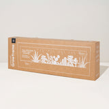 Brown box with white graphics and text on a light gray background Smart Landscape Growframe