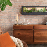 Wooden dresser with decorative items against a brick wall Smart Landscape Growframe