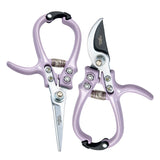 Purple gardening shears with silver blades on a white background