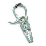 Mint green garden shears on a white background