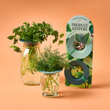 Produce Keepers, 2pk with plants and a 'Produce Keepers' packaging on an orange background