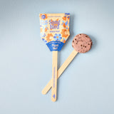 Seed pop with a cookie-shaped top on a light blue background Seed Pops - Pollinator