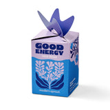 Good Energy seed bomb packaging with blue and purple design on a white background
