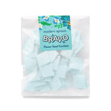 Bag of light blue flower seed confetti with 'Bravo' packaging on a white background