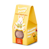 Yellow packaging of 'Bunny Poop' wildflower seed ball with a cartoon rabbit on a white background.