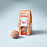 Lip Lamb Poop wildflower seed ball with packaging on a light gray background