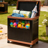 Toy storage box with outdoor toys and items on a patio