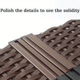 Brown woven mat with metal strip on a white background