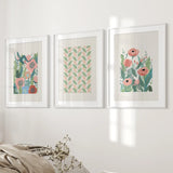 Botanical Pink Poppies Wall Art Poster Decor on a wall above a bed.