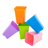 Set of colorful Seed Starter Pots - 2.5" Extra Strength on a white background