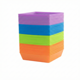Stack of colorful square plastic 5X5 Shallow Microgreen Trays on a white background