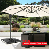 Beige patio umbrella with stand on a patio with garden background