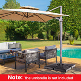 Outdoor patio set with umbrella stand and furniture near a pool