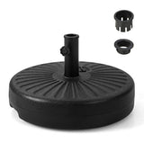 Black patio umbrella base with additional components on a white background