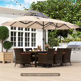 Beige patio umbrella over a dining set on a wooden deck with a house and trees in the background.