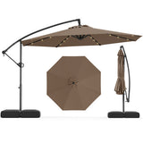 Brown patio umbrella with stand on a white background