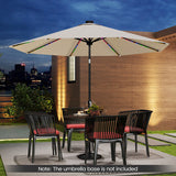 Outdoor patio set with umbrella and chairs on a patio with city skyline in the background