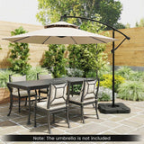 Outdoor patio set with table, chairs, and cantilever umbrella in a garden setting.