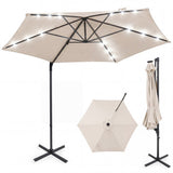 Beige patio umbrella with stand on a white background
