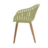 Green chair with wooden legs on a white background