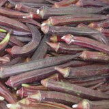 Close-up of a pile of okra pods with a dark purple and green color. OKRA Seeds, Red Burgundy
