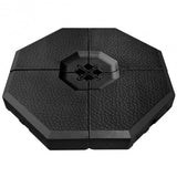 Black octagonal training pad with textured surface on a white background