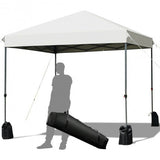 White outdoor canopy tent with black carrying bag on a white background