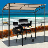 Barbecue grill with canopy on a beach