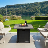 Outdoor patio setting with a 30 Inch Square Propane Gas Fire Pit Table Ceramic Tabletop, chairs, and a scenic view of a lake.