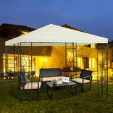 Outdoor gazebo with seating area in a garden setting at night.