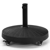 Black patio umbrella stand with wheels on a white background