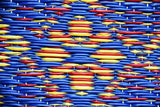 Colorful pattern of red, yellow, and blue shapes on a blue background Turkish Blue