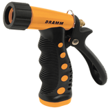 Black and orange Dramm garden hose spray nozzle on a white background